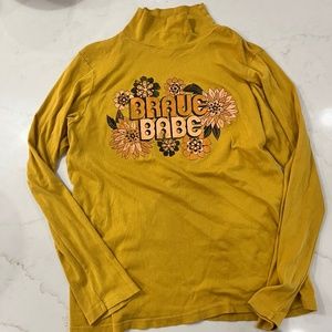 Dazey L.A. Brave Babe mustard turtle neck tee